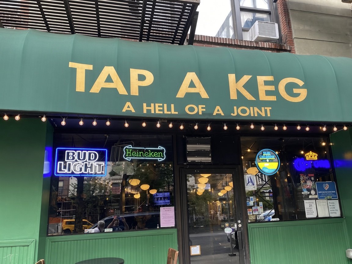 Tap a Keg storefront on Broadway: green awning, TAP A KEG, A Hell of a Joint